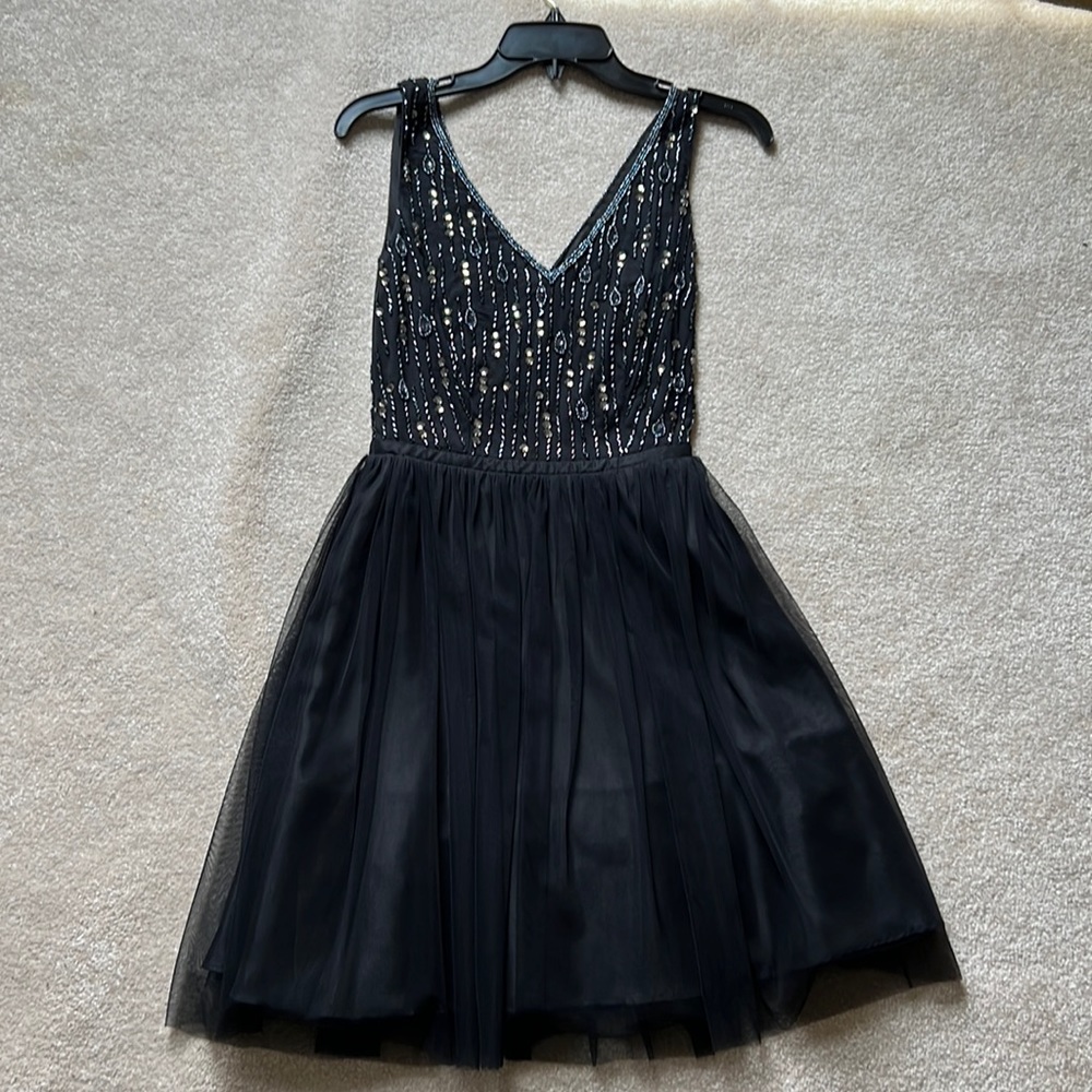 Adorable little black dress!